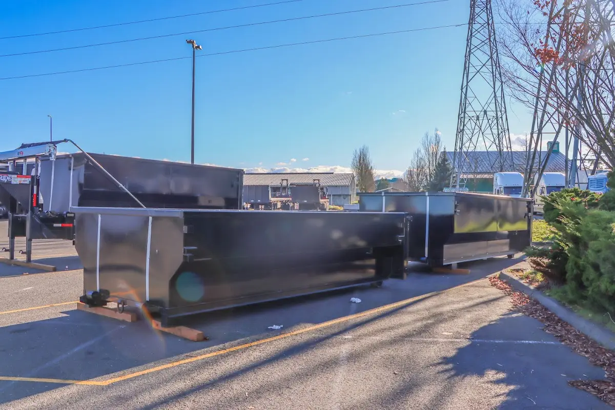 Roll-off dumpster ready for waste disposal at job site for 10 Yard Dumpster Rental in Aston